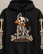 Close-up of ivory skeleton pup and orange DA bone chest design on black hoodie — digital mockup